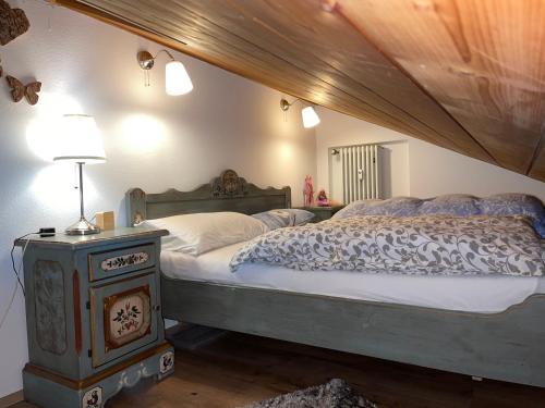 Postel nebo postele na pokoji v ubytování Apartment Garmisch Zugspitze