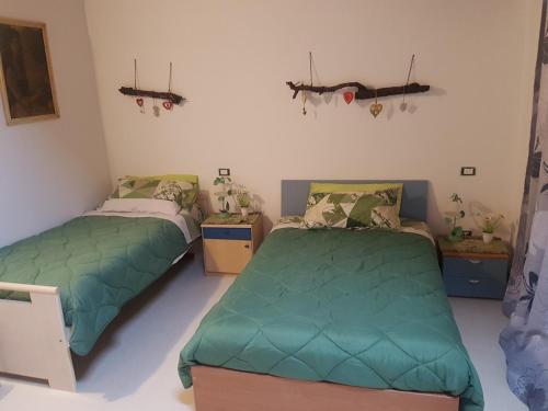 - une chambre avec 2 lits dans l'établissement Al Fienile, à Orzano