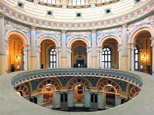 a large building with a spiral staircase in it at Zdrój Wojciech in Lądek-Zdrój