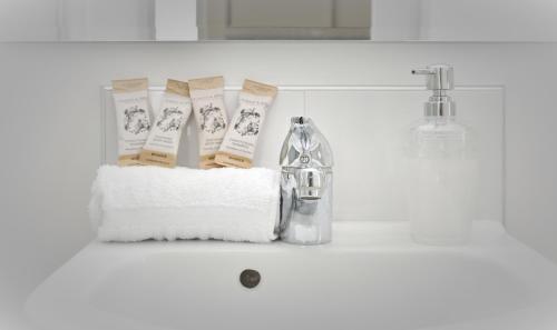 a sink with a faucet and some towels at High Country Villa 239 - Canterbury Terrace Downs in Hororata