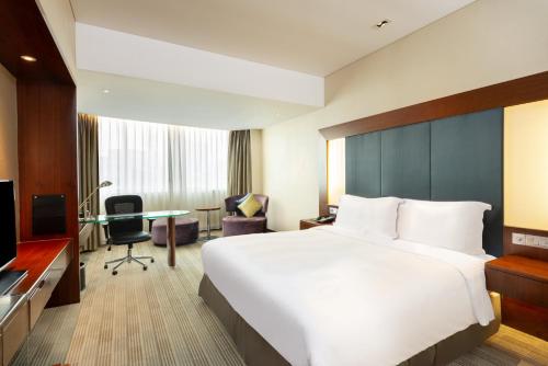 Μια τηλεόραση ή/και κέντρο ψυχαγωγίας στο Holiday Inn Shanghai Pudong by IHG