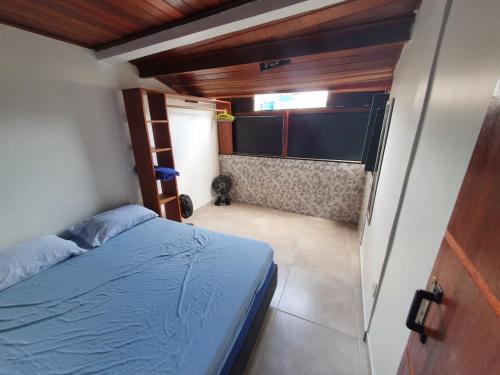 מיטה או מיטות בחדר ב-Alberi Temporada Casas