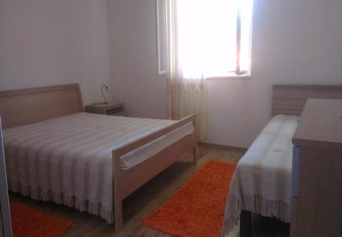 Posteľ alebo postele v izbe v ubytovaní Apartments Nikša - 10 m from beach