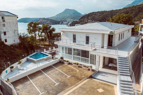 an aerial view of a house with a swimming pool at Vila Nikezić in Sutomore