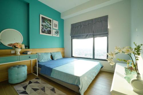 Katil atau katil-katil dalam bilik di Sue homestay Ecopark