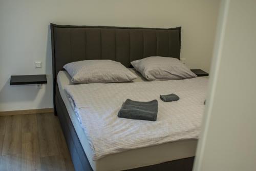 Posteľ alebo postele v izbe v ubytovaní Stream Apartment Bojnice