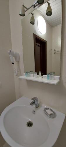 Ванная комната в Hotel Gosti