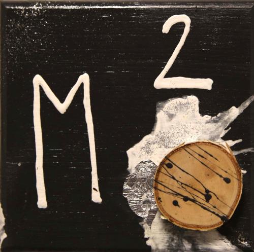 a sign with a letter m and a basketball at M4 Appartements in Wagrain