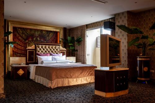 Ein Bett oder Betten in einem Zimmer der Unterkunft In-stone Motel