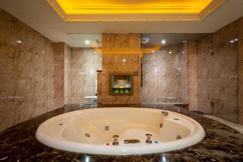 Ein Badezimmer in der Unterkunft In-stone Motel