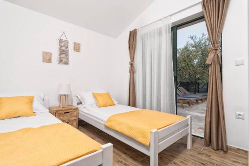 Posteľ alebo postele v izbe v ubytovaní Holiday Home Secret