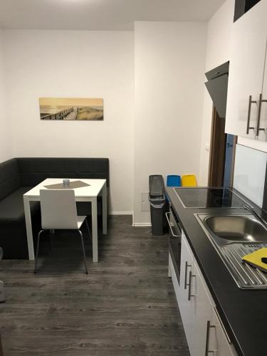 Η κουζίνα ή μικρή κουζίνα στο Appartements am Hafen