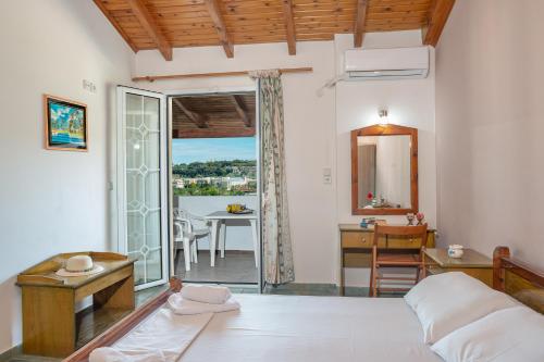 Postel nebo postele na pokoji v ubytování Georgia Apartments