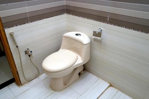 Vonios kambarys apgyvendinimo įstaigoje New Era Guest House