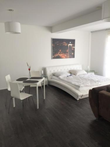 Ένα ή περισσότερα κρεβάτια σε δωμάτιο στο Appartements am Hafen
