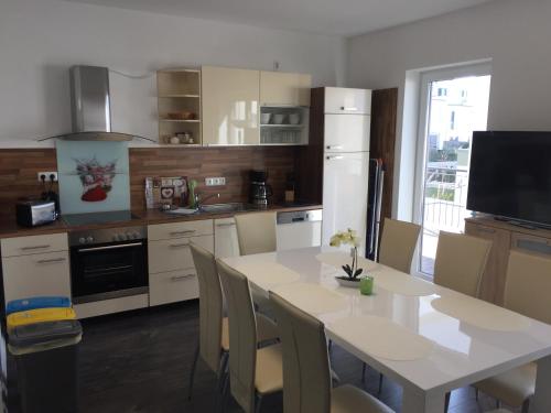 Η κουζίνα ή μικρή κουζίνα στο Appartements am Hafen