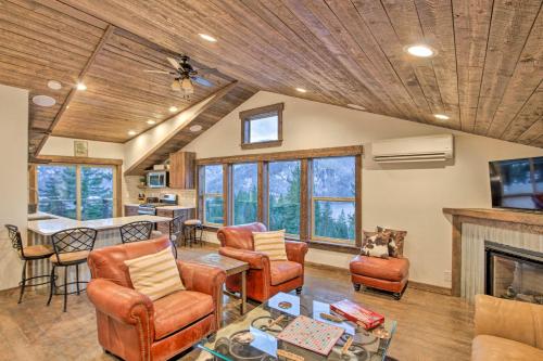 a living room with furniture and a fireplace at Cle Elum Lake Bunkhouse with Shared Hot Tub and Views! in Ronald