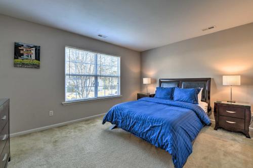 A bed or beds in a room at Updated Charlotte Home with Central AandC - Near UNCC