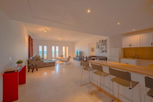 A kitchen or kitchenette at VESTA - El Gouna Residence