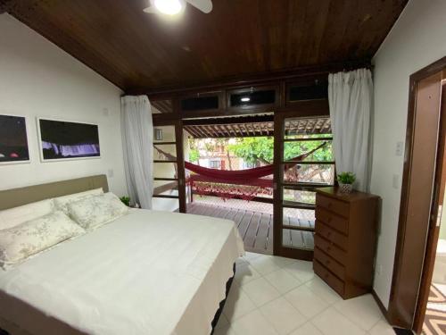 Postel nebo postele na pokoji v ubytování Casa Tropical pé na areia