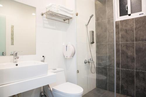 Un baño de Bai Sha Tan Cottage