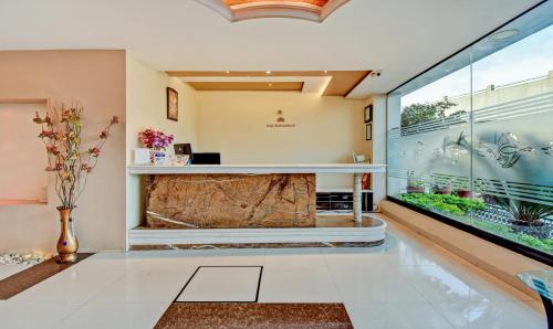 Zona de estar de Treebo Raj Elegance Manyata Tech Park