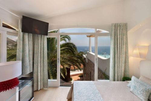 Katil atau katil-katil dalam bilik di Amore Rentals - Villa Ariadne