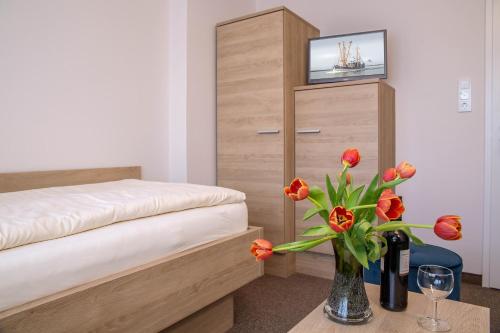 Postel nebo postele na pokoji v ubytování Pension Ursula