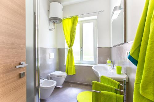 Ένα μπάνιο στο Nonna Adelina Apartments & rooms