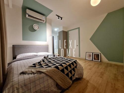 a bedroom with a bed with a checkered blanket at Spacious Big Room, Designed & Quiet Family Home, Eclipse in Cyberjaya by Flexihome-MY in Cyberjaya