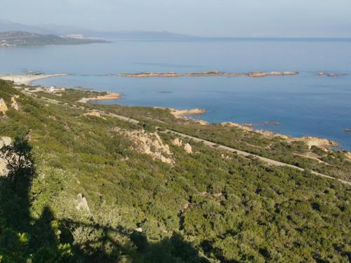 an aerial view of an island in the water at Relax Home in La Caletta