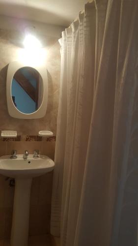 Et badeværelse på Triplex 3 habitaciones