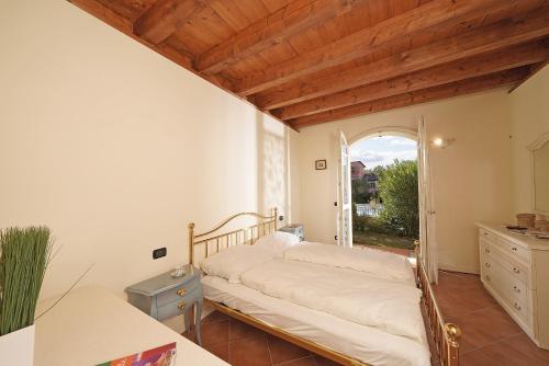 Postelja oz. postelje v sobi nastanitve Borgo Del Torchio - Gardagate