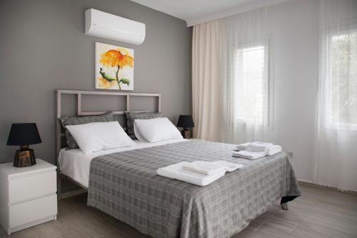 Postel nebo postele na pokoji v ubytování Dadya Villa 1 - Villa with private pool - 750m distance to the beach