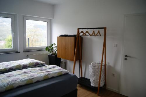Кровать или кровати в номере Ferienhaus Fräulein Frenz