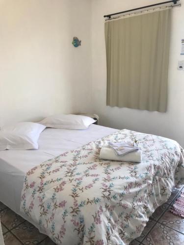 Llit o llits en una habitació de Hotel Ilha Bella