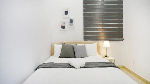 Posteľ alebo postele v izbe v ubytovaní Desaru Exclusive Elegant theme by Joyfully 2M8
