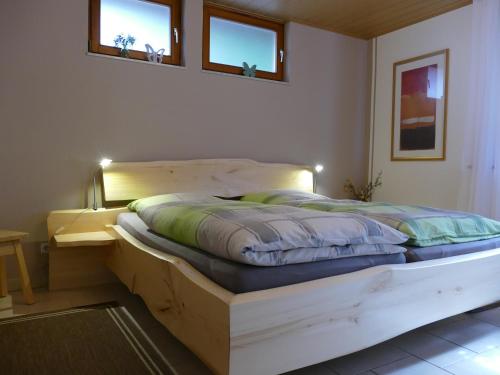 Postel nebo postele na pokoji v ubytování Ferienwohnung Quelle