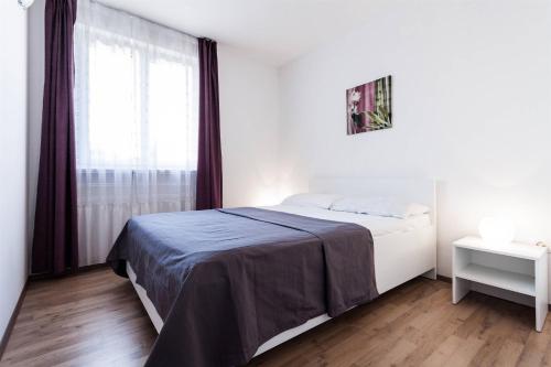 Postel nebo postele na pokoji v ubytování App Zlatar