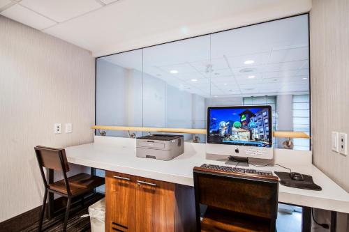 an office with a desk with a computer on it at Holiday Inn Express & Suites Langley by IHG in Langley