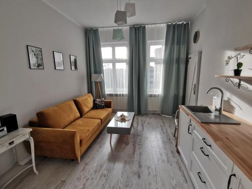 Przytulny apartament w centrum Kupiecka-Drzewna tesisinde bir oturma alanı