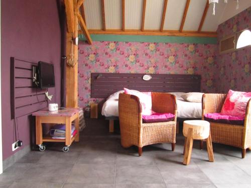 Area tempat duduk di Bed and Breakfast Klein Groenbergen