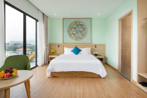 Postel nebo postele na pokoji v ubytování Hoan My Resort - Ninh Chu