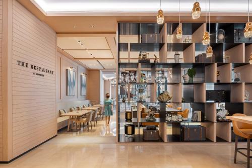 a view of the restaurant with tables and chairs at Address Beach Resort in Dubai