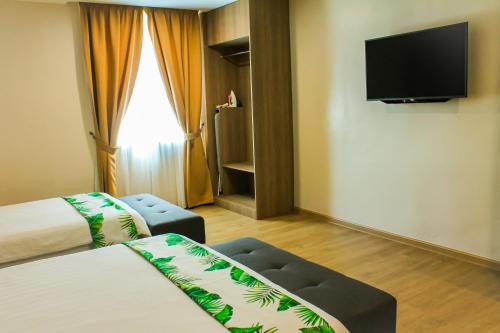 โทรทัศน์และ/หรือระบบความบันเทิงของ Savana Hotel & Serviced Apartments