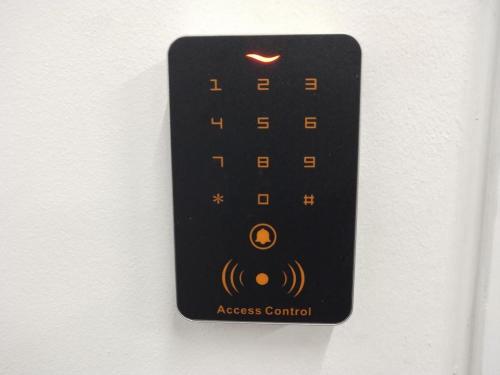 a close up of a remote control on a wall at Punsuk in Khon Kaen