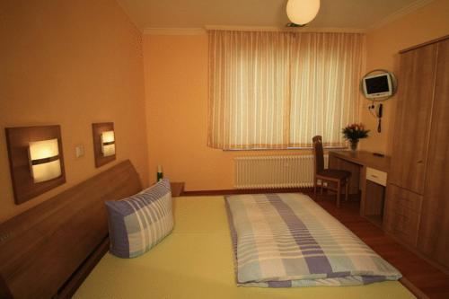 Cama o camas de una habitación en Hotel Voxtrup