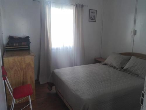 Ένα ή περισσότερα κρεβάτια σε δωμάτιο στο Estancia Pacífico