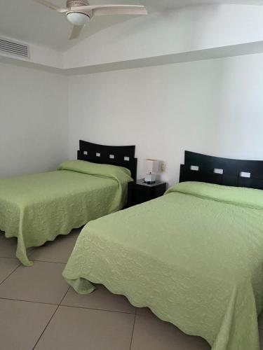 Ένα ή περισσότερα κρεβάτια σε δωμάτιο στο Bay View Grand Marina 1605 Sur