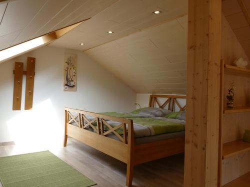 Tempat tidur dalam kamar di Ferienwohnung Lichtblick